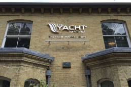Exterior signage for The Yacht Market